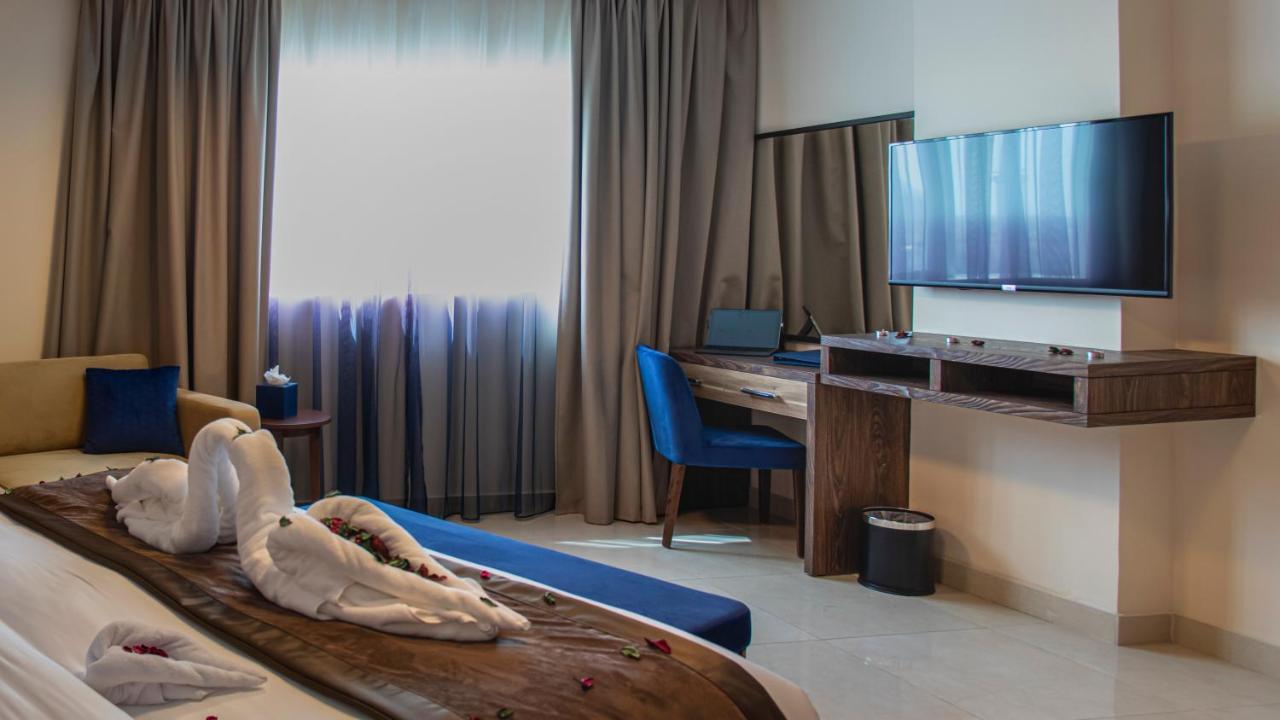 Viola Hotel Apartments Шарджа Экстерьер фото